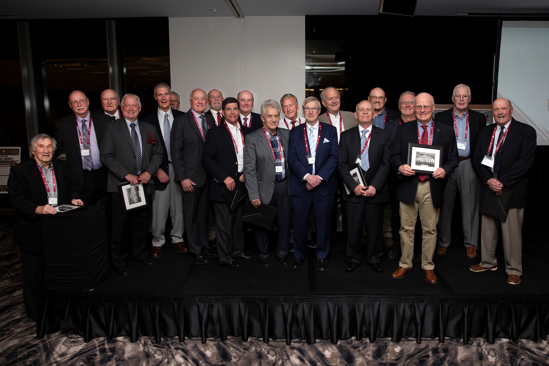 Group photo of men in suits.