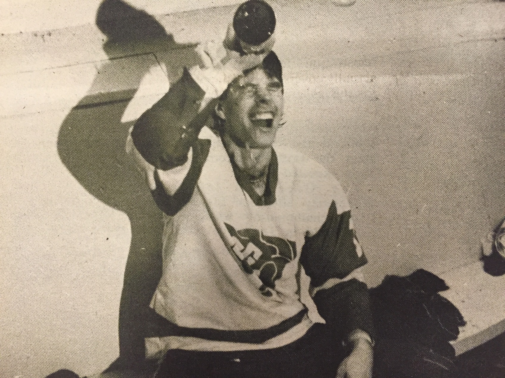 A Gee-Gees player pours champagne on himself in the locker room.