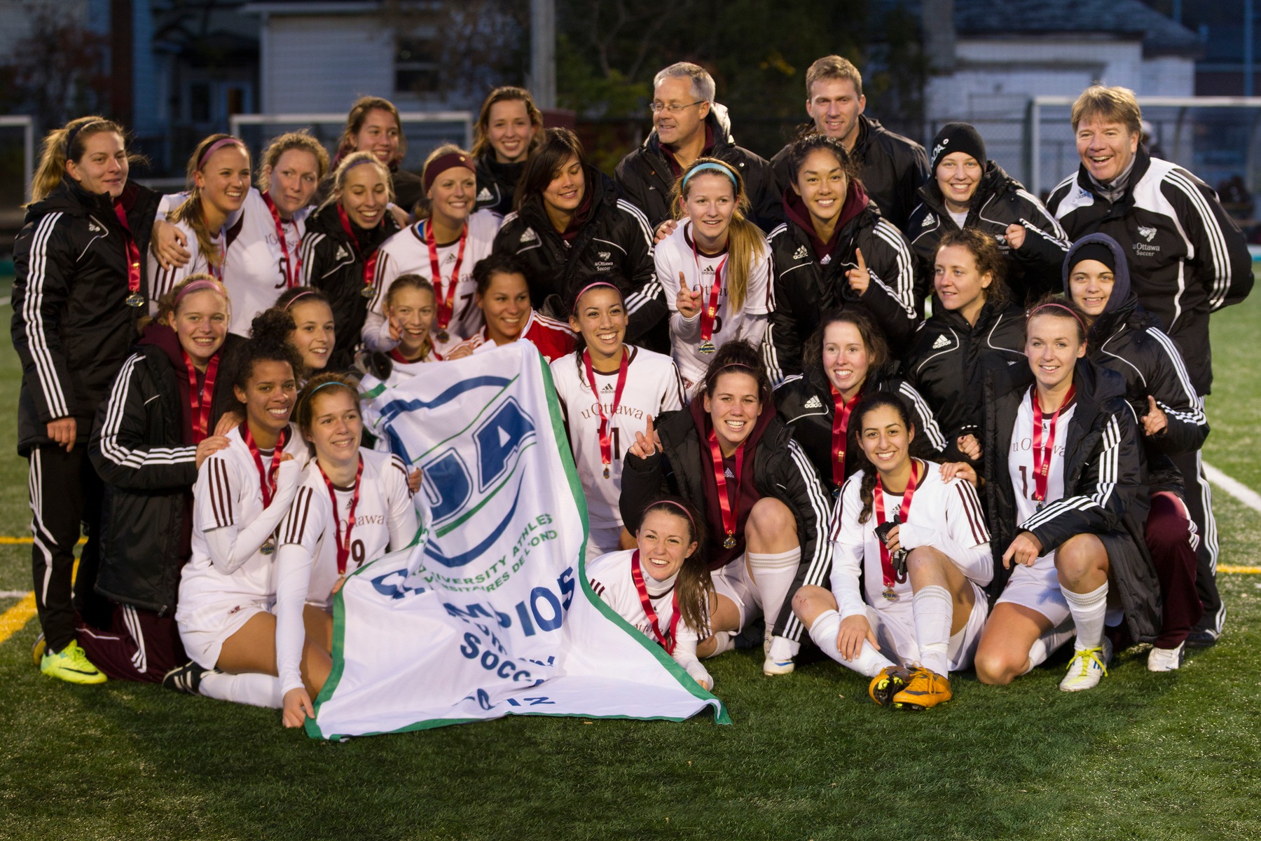 Team photo with championship banner