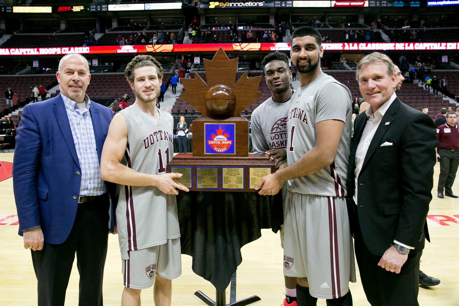 Mike L'Africain, Caleb Agada, and Vikas Gill in 2016.